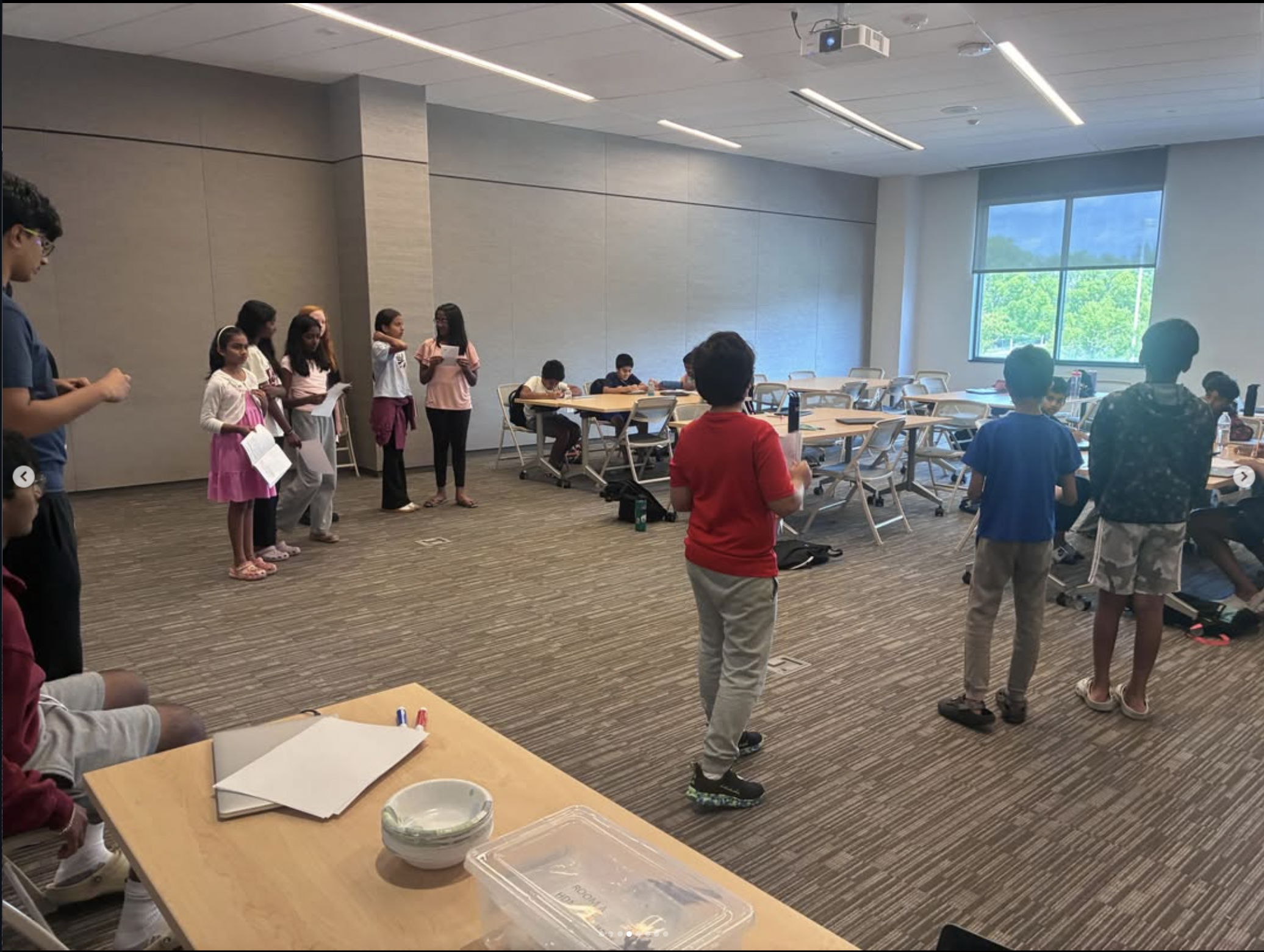 Students presenting in a circle